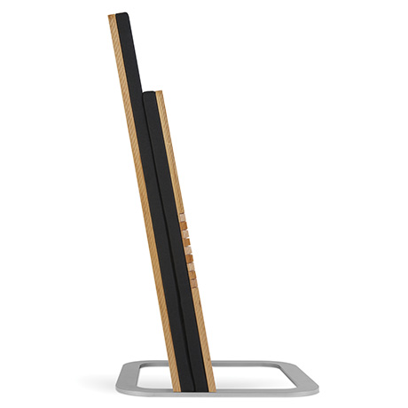 JumpSeat Standard with black upholstery in a side view with moveable base and lifted seat